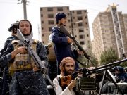 Тапочники с калашом наперевес и черным знаменем на стенке… Тапочники с калашом наперевес и черным знаменем на стенке...