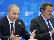 Ушаков сообщил о беседе Путина и Шредера